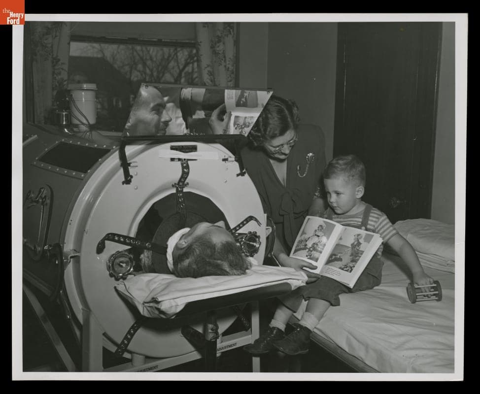 Iron Lung Patient with Visitors at Henry Ford Hospital, Detroit, Michigan, Christmas 1946