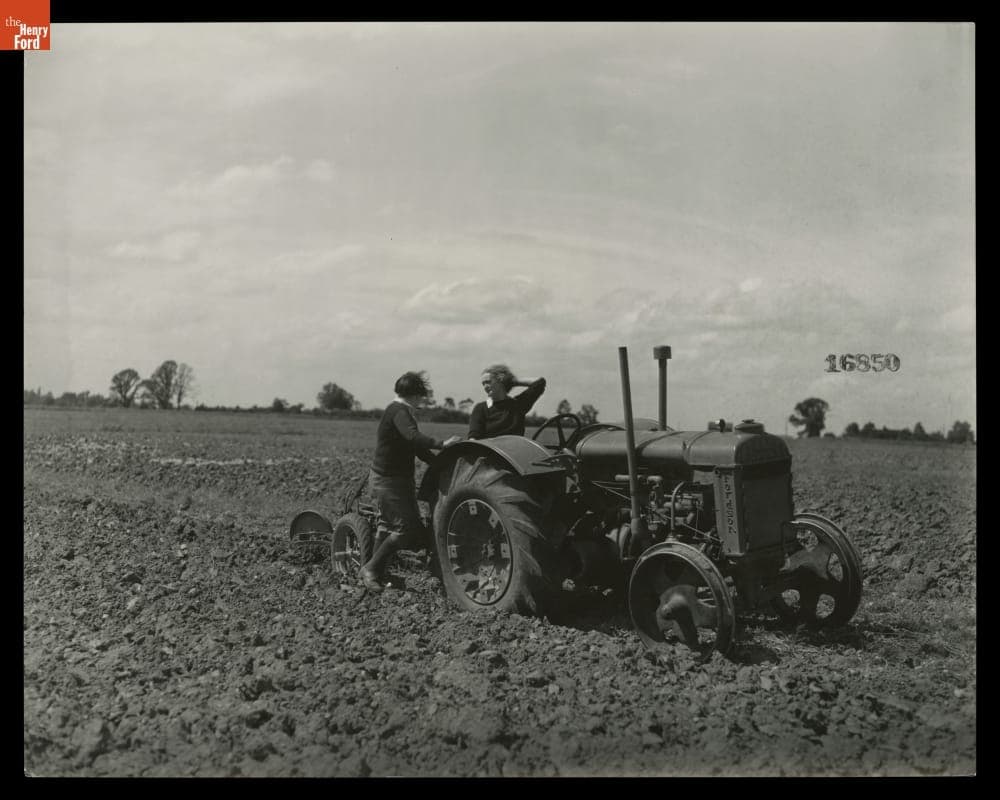 Two Students in a Field with a Tractor at Henry Ford Institute of Agricultural Engineering, England, 1939