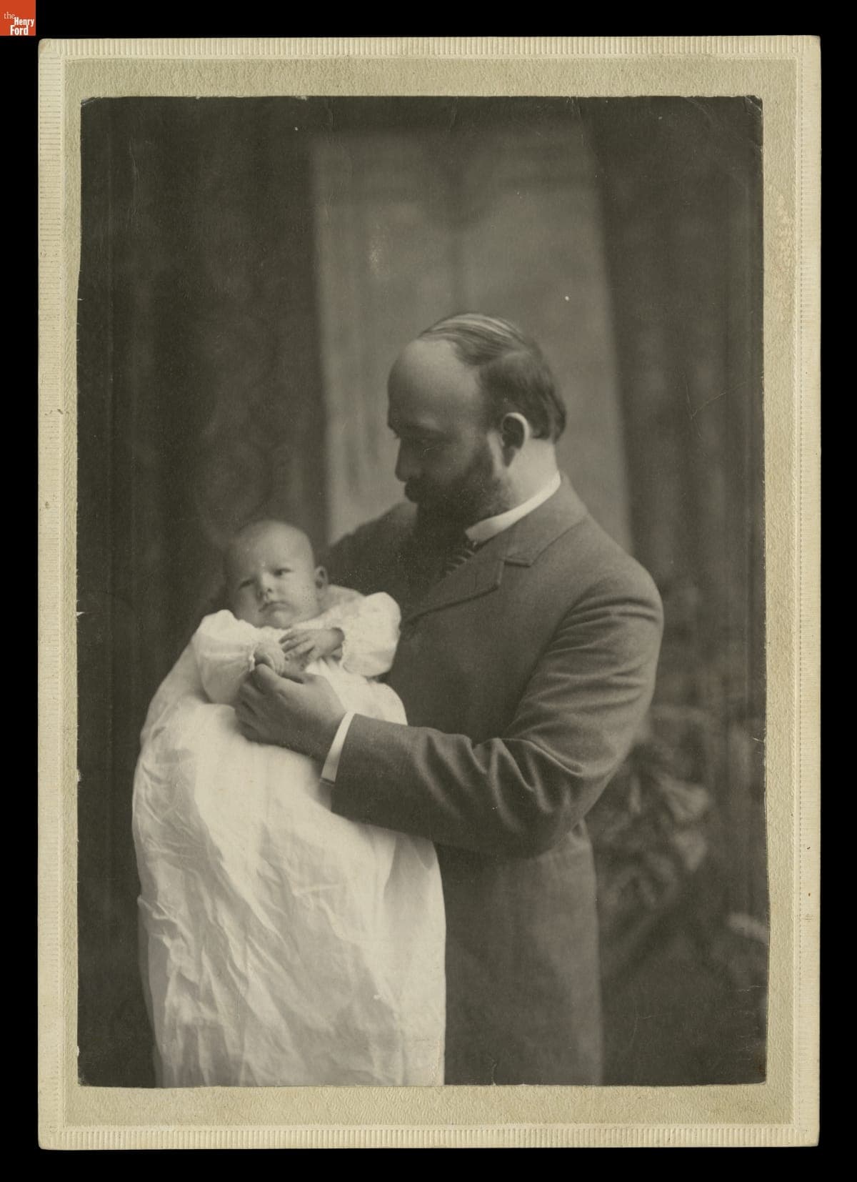Father and Child at the Child's Christening, circa 1900