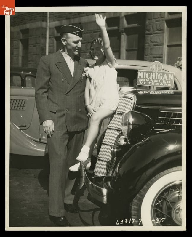Michigan Disabled Veteran Posing with Little Girl, Ready to Depart for American Legion Convention, 1935