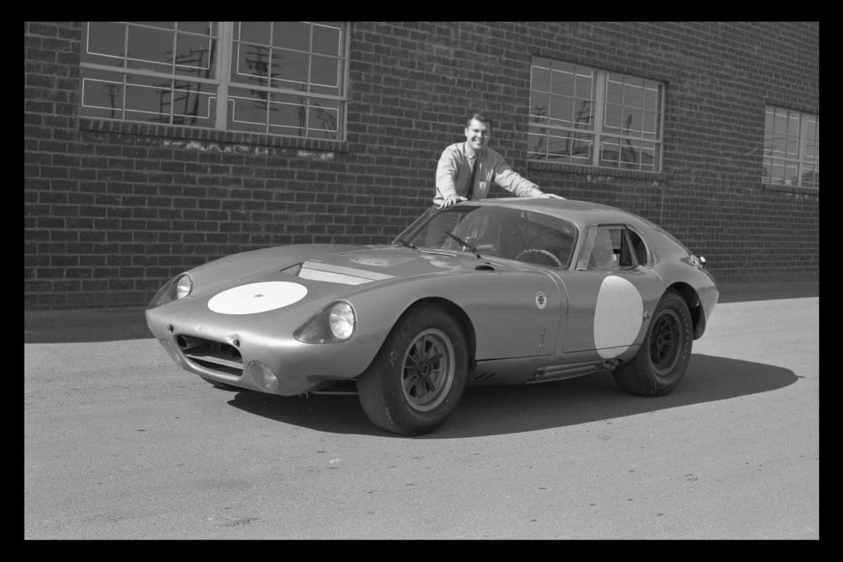 Automotive Designer Pete Brock with Shelby Cobra Daytona Coupe, circa 1964