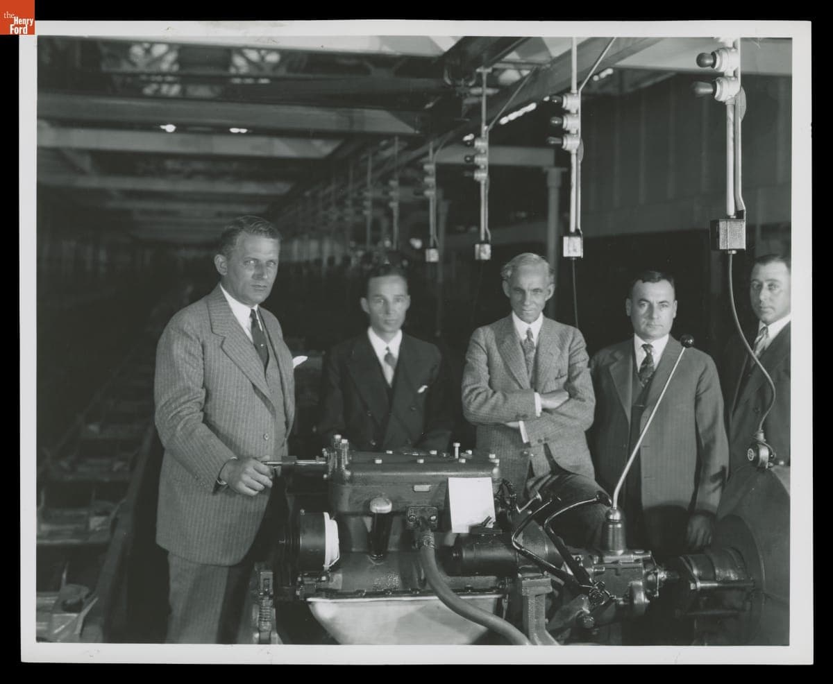 Henry Ford, Edsel Ford, and Ford Motor Company Executives with Model A Engine, October 1927