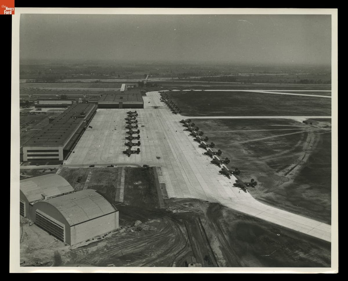 Aerial View, B-24 Liberators Outside Hangar/Gas House at Ford Motor Company Willow Run Bomber Plant, September 1945