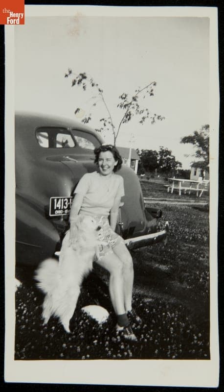 Woman with Dog at Lore Mac Cabins Motel Tourist Cabins, Brooklyn, Michigan, circa 1945