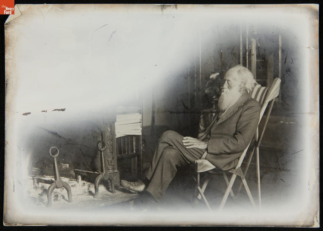 John Burroughs Sitting at the Fireplace at Woodchuck Lodge, 1918