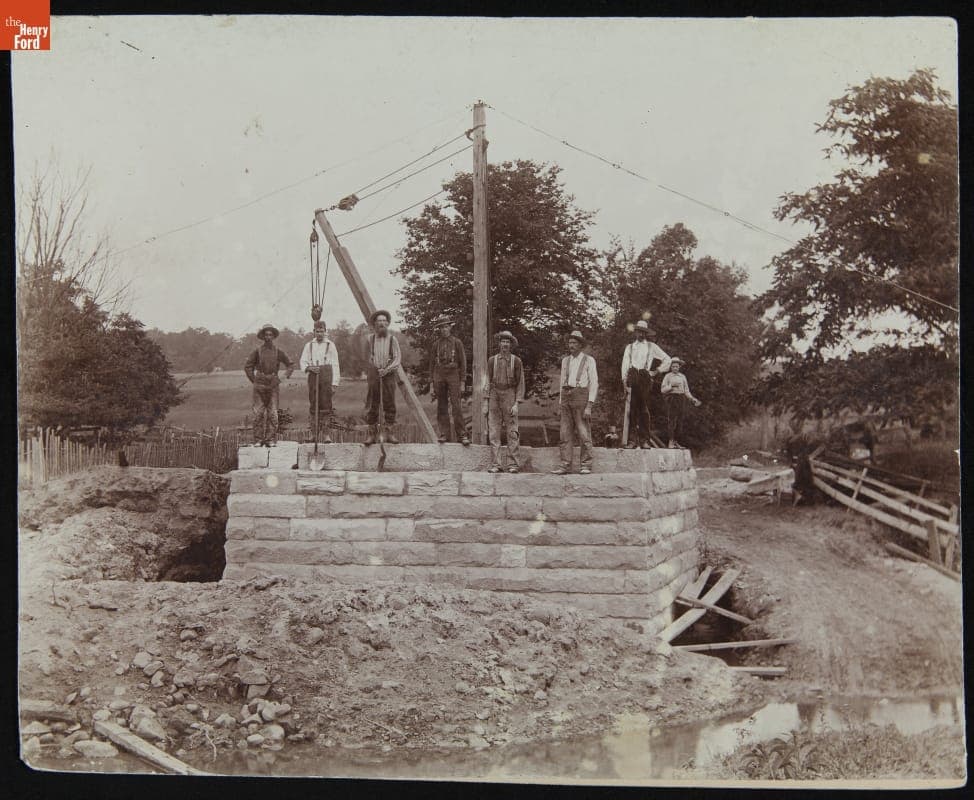 Workmen Standing on Large Cut-stone Structure Holding Tools, Springfield Ohio, circa 1885