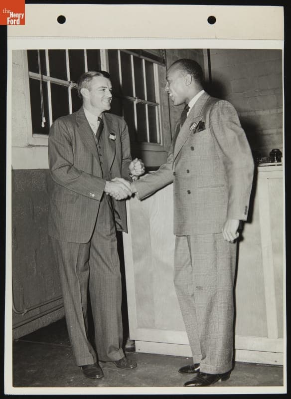 Tommy Bridges Welcomes Jesse Owens to Work at Ford Motor Company, November 23, 1942