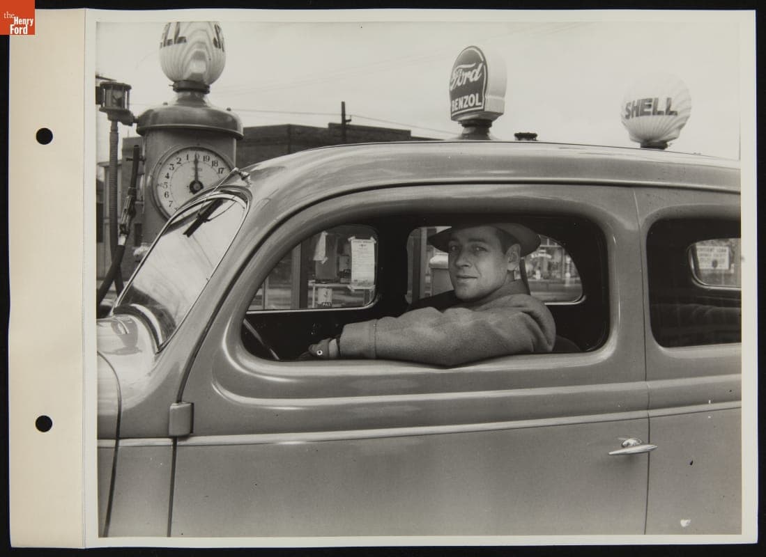 Man in Car at Fuel Pump at Ford Super Service Station, April 1936