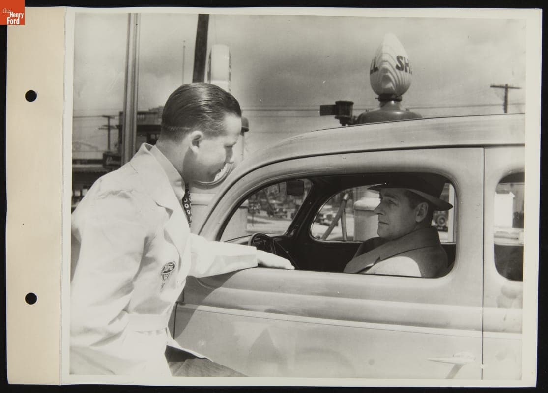 Service Manager Speaking with Man in Car at Ford Super Service Station, April 1936
