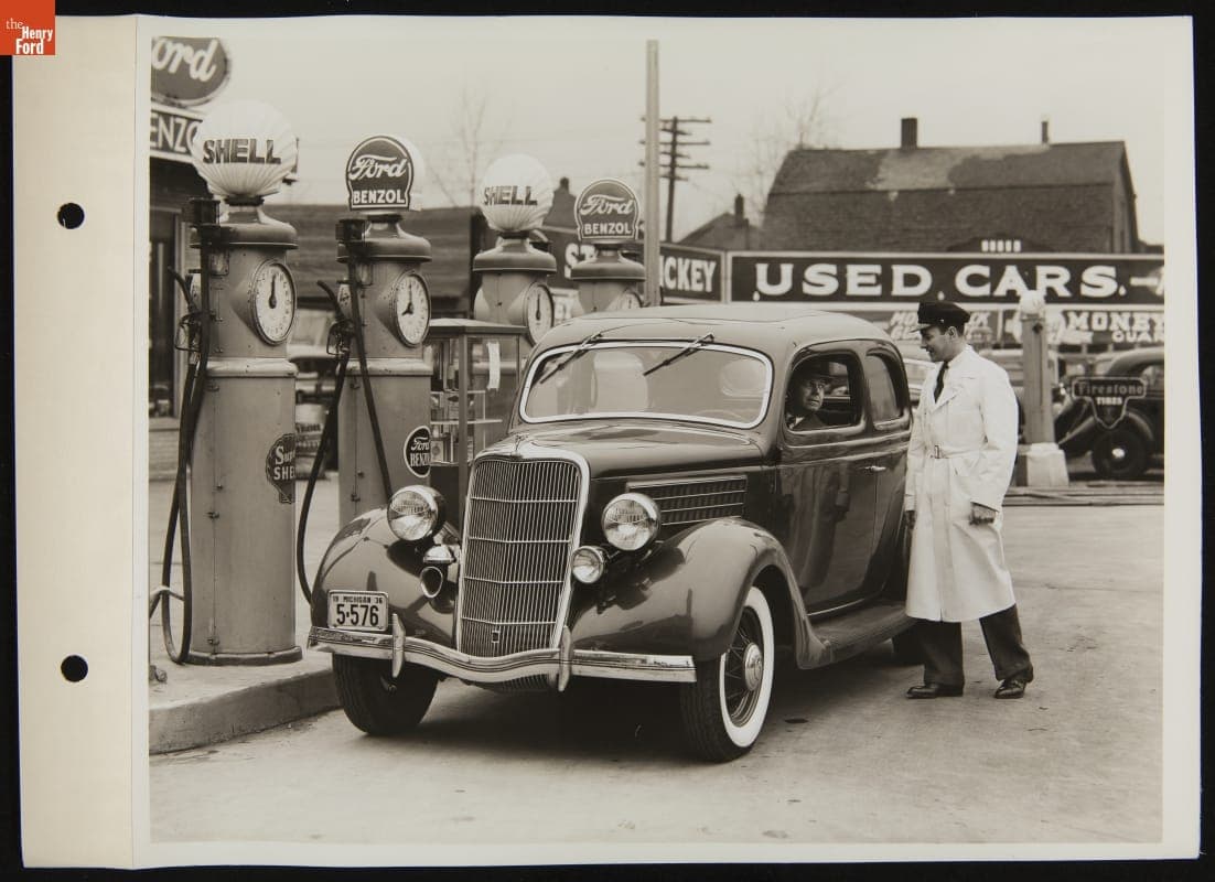 Attendant Assisting Customer at Ford Super Service Station, April 1936