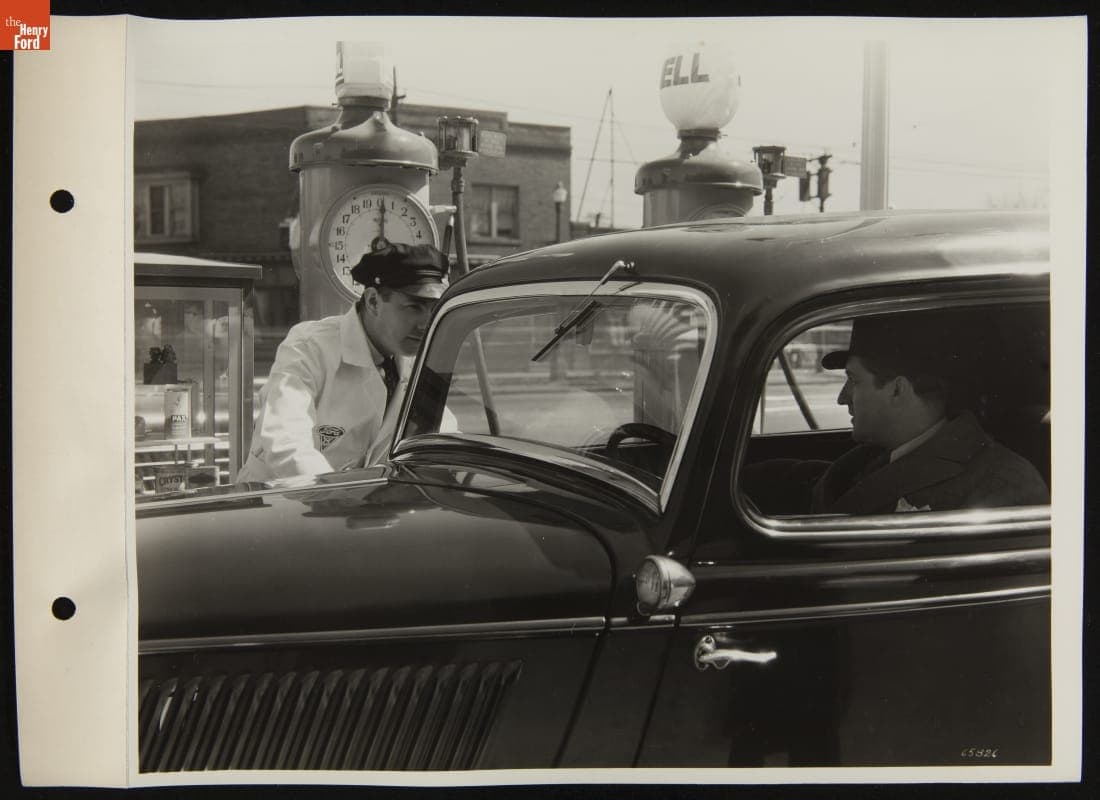 Attendant Talking with Customer at Service Station, April 1936