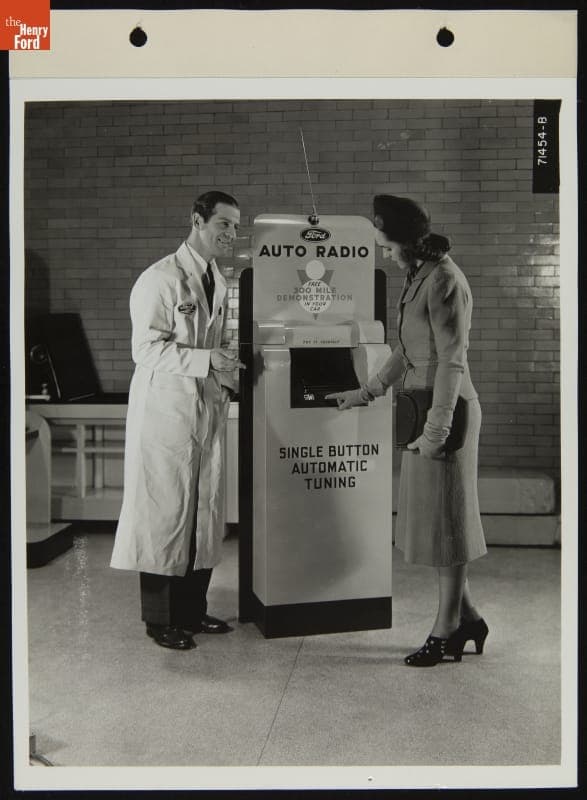Attendant Shows the Ford Auto Radio Display to a Customer, February 1939