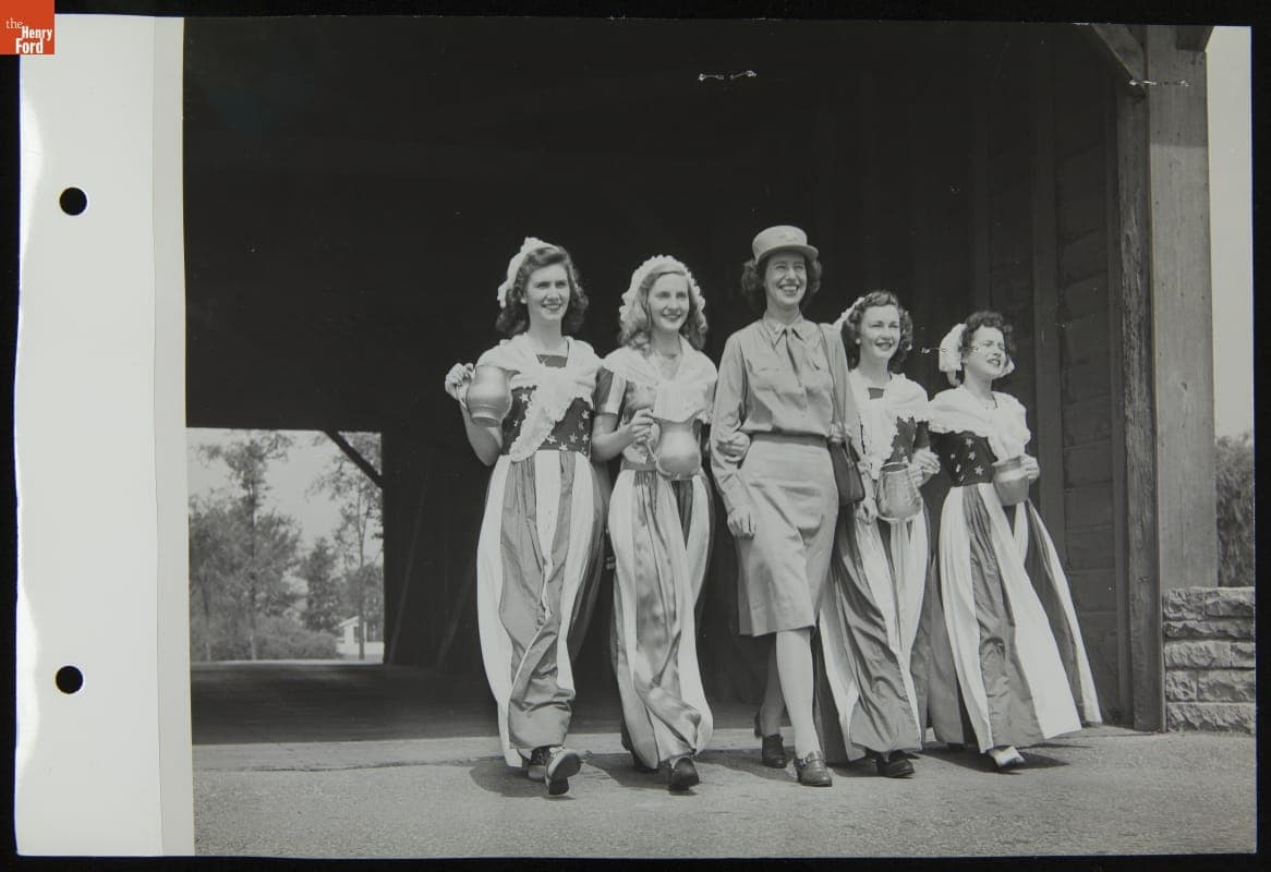 Woman Soldier with "Modern Molly Pitchers" Selling War Bonds and Stamps on National Molly Pitcher Tag Day, August 4, 1943