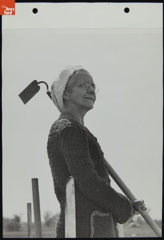 Woman Holding Garden Hoe, May 1944