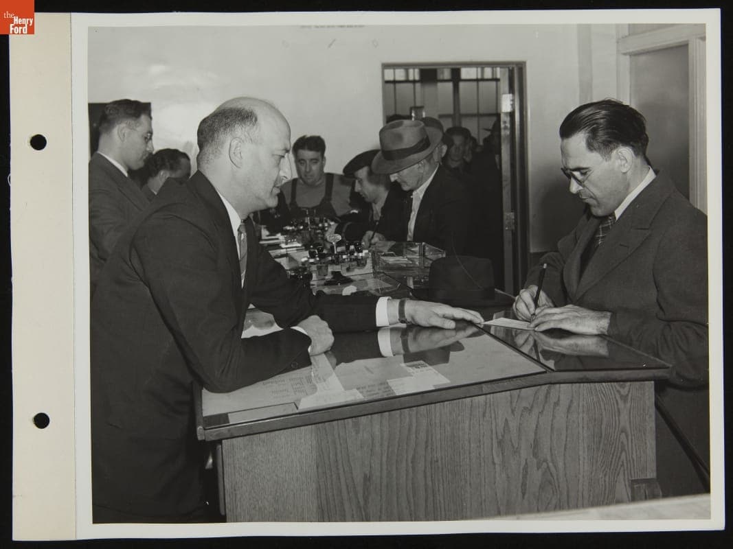 Ford Employee Sylvester Rypkowski Filling Out Paperwork, October 1942