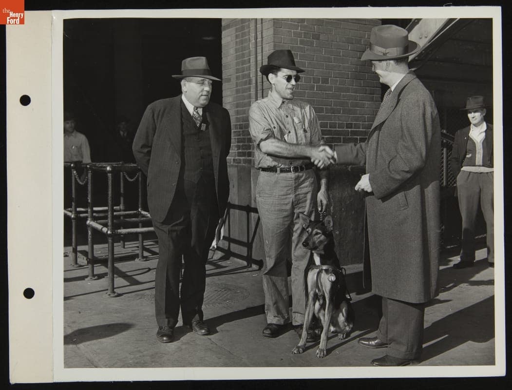 Ford Employee Sylvester Rypkowski with His Service Dog "Blackie," October 1942