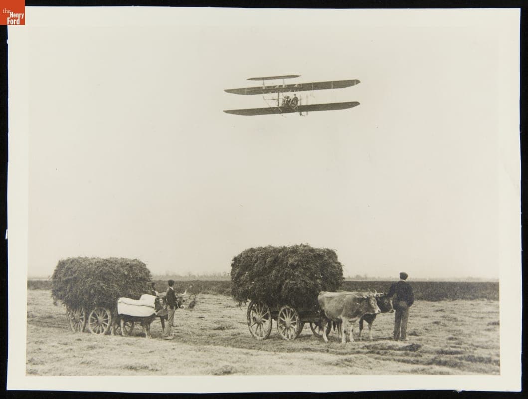 Wilbur Wright Flying over a Farm, Pau, France, 1909