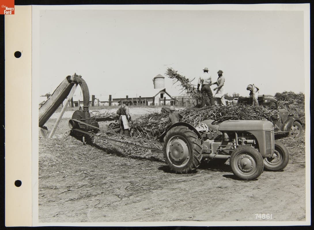 Men Chopping Sillage with a Ford-Ferguson 9N Tractor, January 16, 1941