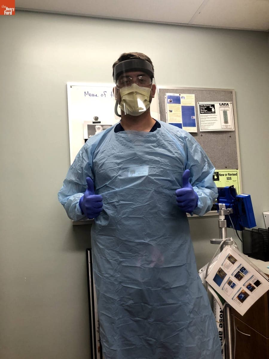 Zach White Wearing COVID-19-Protective Clothing and Equipment over Scrubs in a Medical Clinic, August 13, 2020