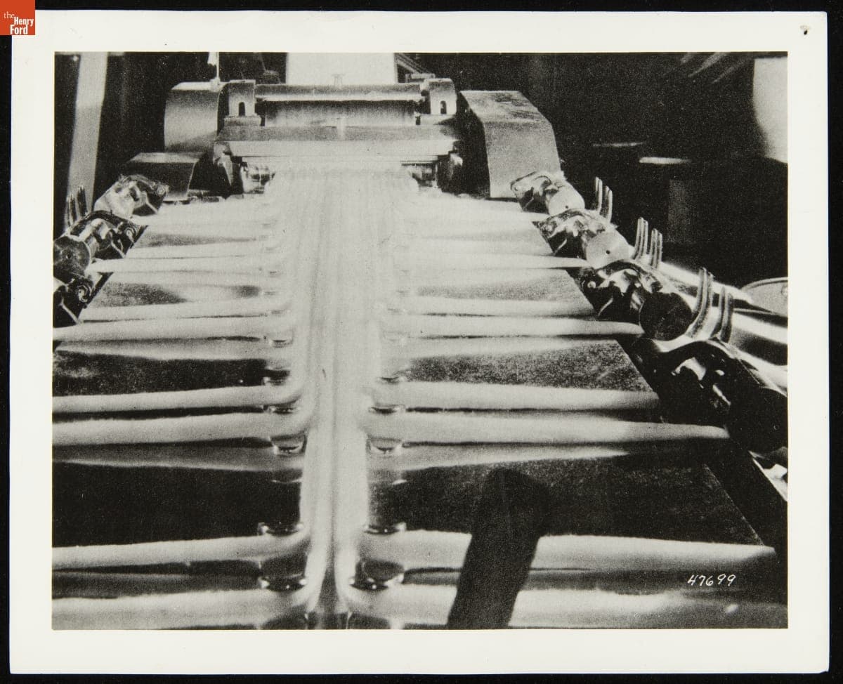 Large Cotton Threads Rolled into Large Cans before Entering the Doubling Machine, circa 1935