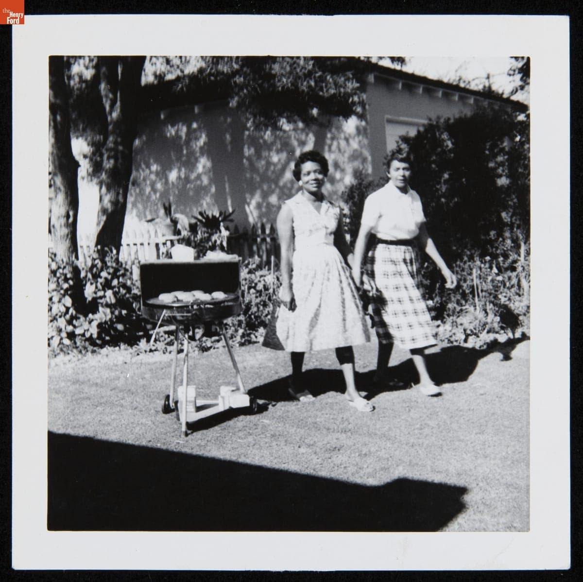 Two Women near a Barbecue Grill at a Picnic, 1947-1957