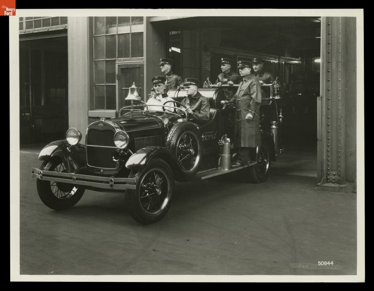 Firefighters Riding a Ford Model A Fire Truck, January 17, 1928