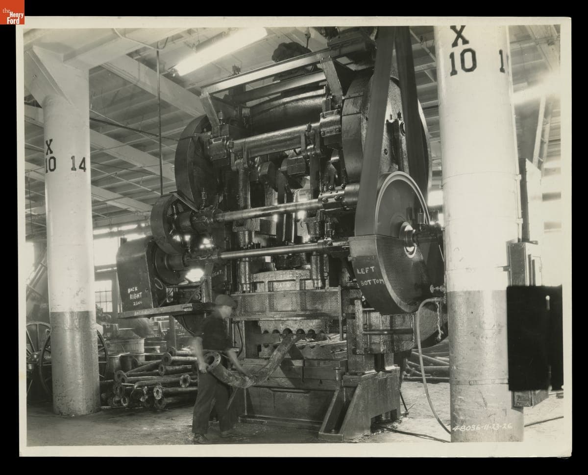 Worker Operating a Press in the Salvage Department at the Ford Motor Company Rouge Plant, November 1926
