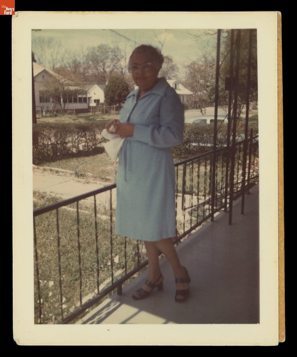 Juanita Richardson Sherrod on the Porch of a House