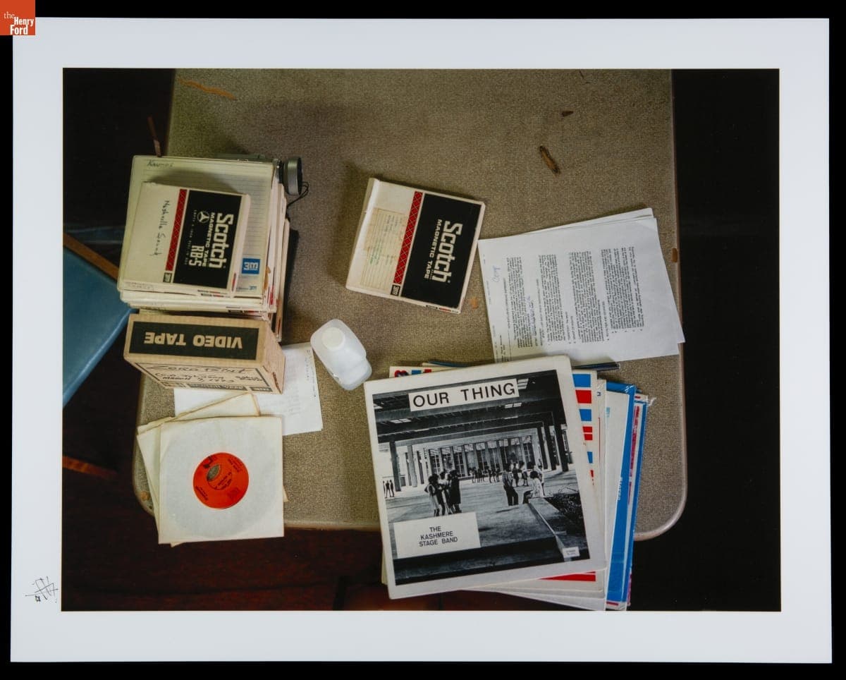 Table in Conrad O. Johnson's Home with Magnetic Recordings, Vinyl Records, and Record Contract for Kashmere Stage Band, 2004