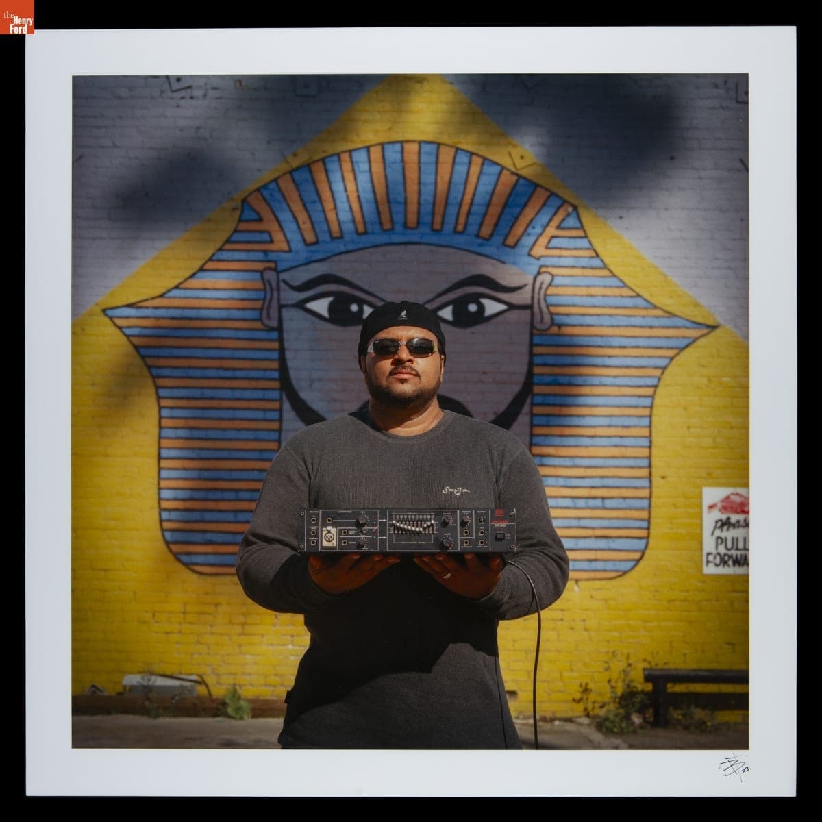 Musician and Vocalist Egyptian Lover with a Vocoder in Front of a Mural of his Likeness as an Egyptian Pharaoh, April 2004