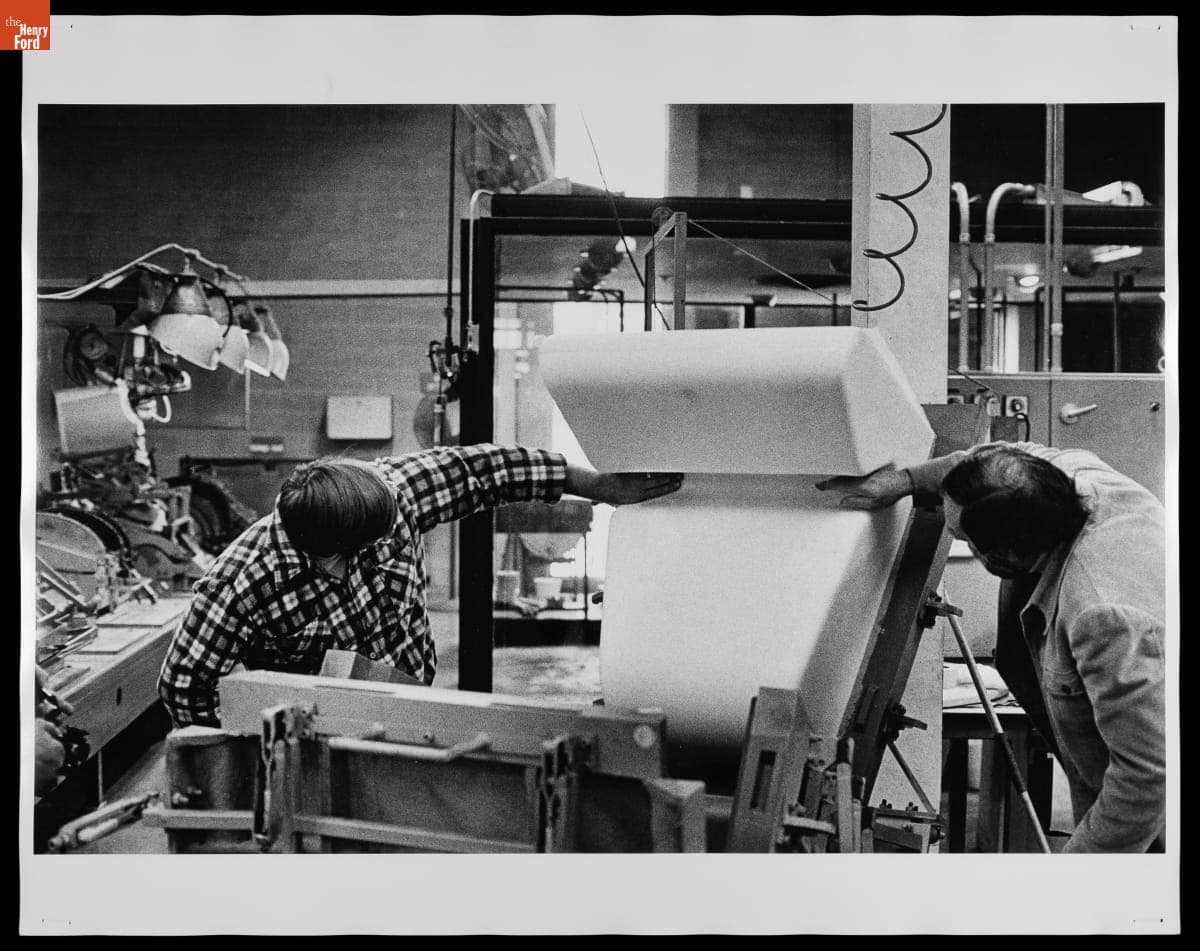 Don Chadwick and Bob Blaich Examining Modular Sofa Component, circa 1973