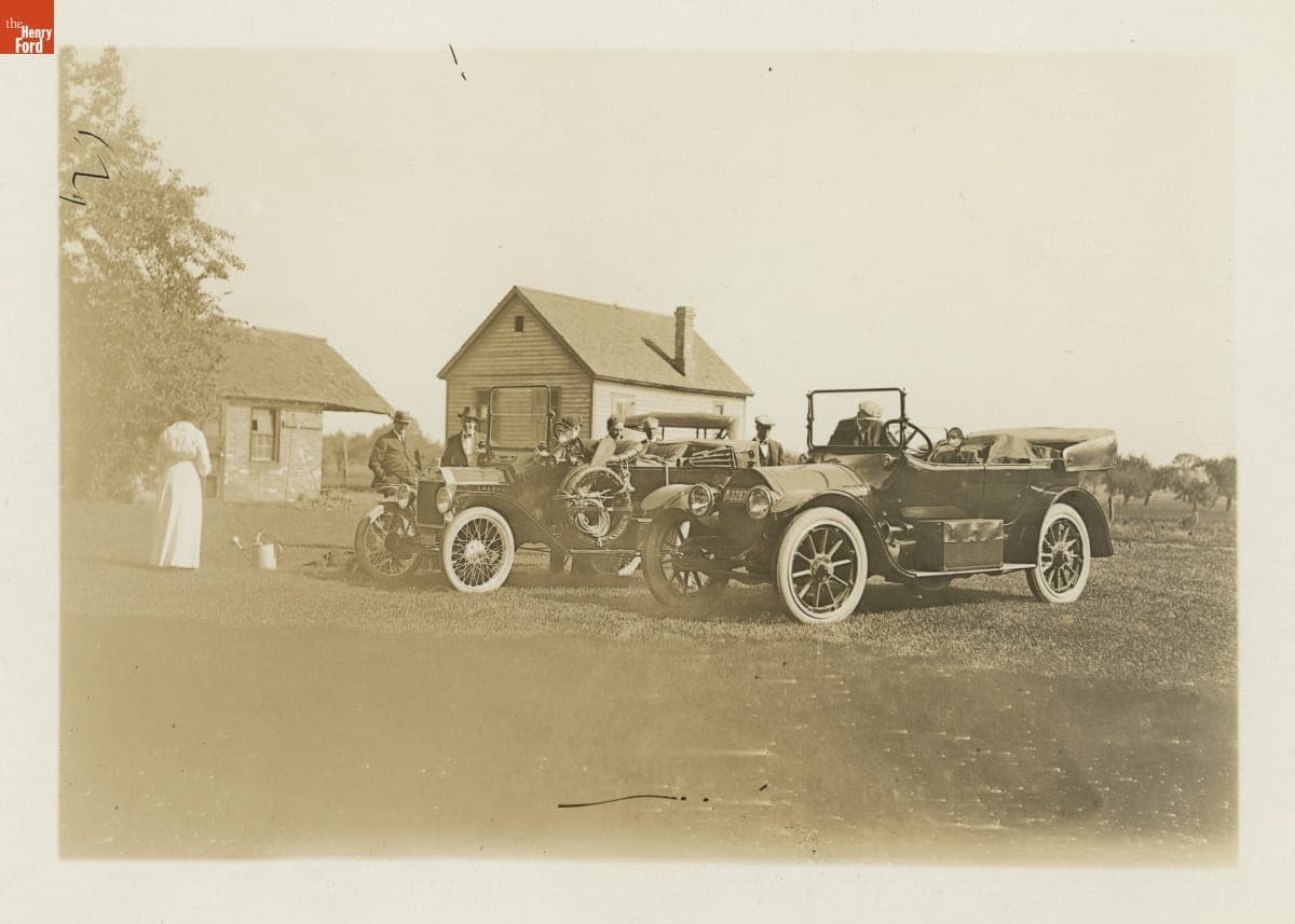 Clara and Henry Ford Watch as Edsel Ford and Friends Start Their Cross-Country Road Trip, June 17, 1915