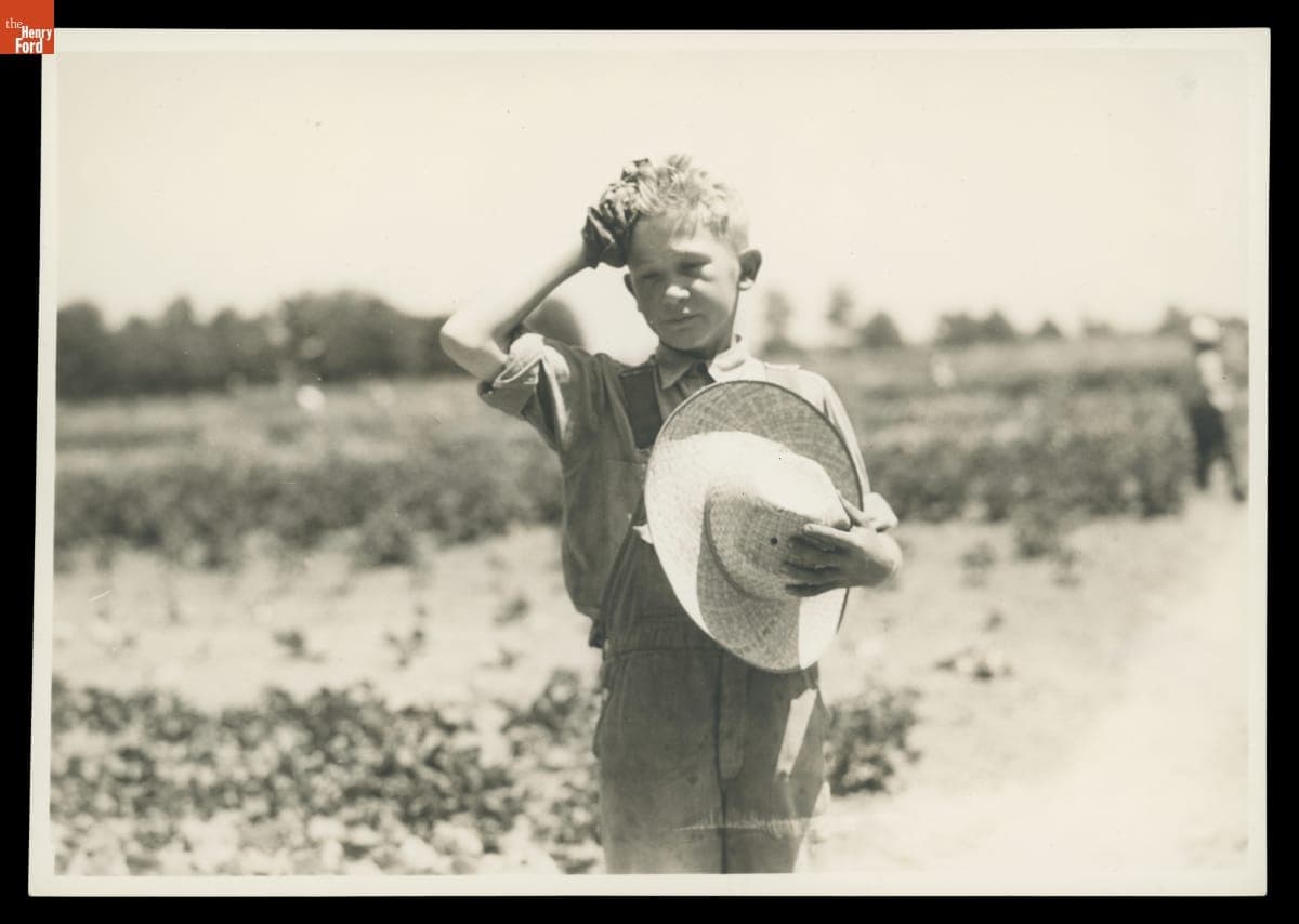 Student Taking a Break from Working in School Garden at Willow Run School, Michigan