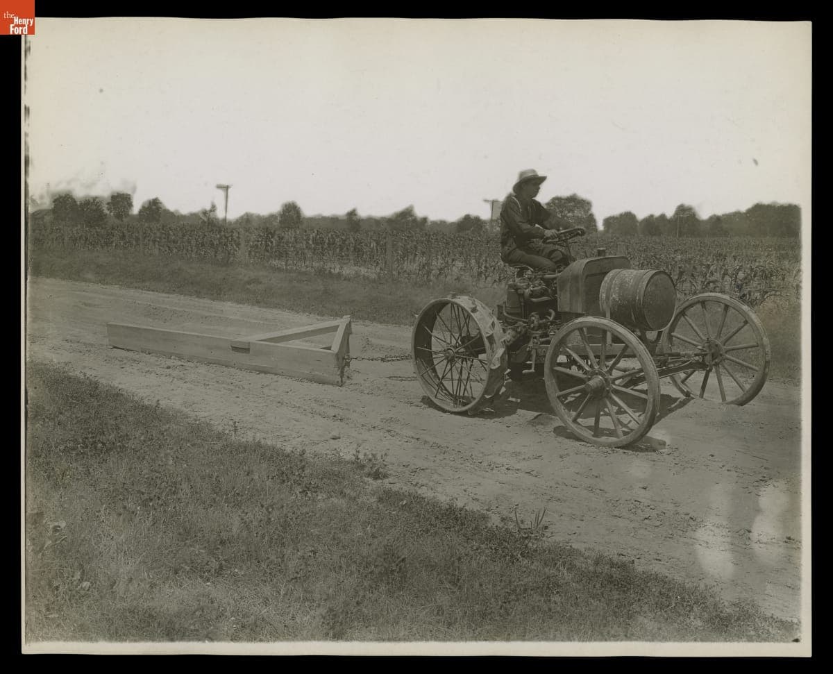 Burt W. Scott Operating an Experimental Ford Tractor, circa 1906-1907