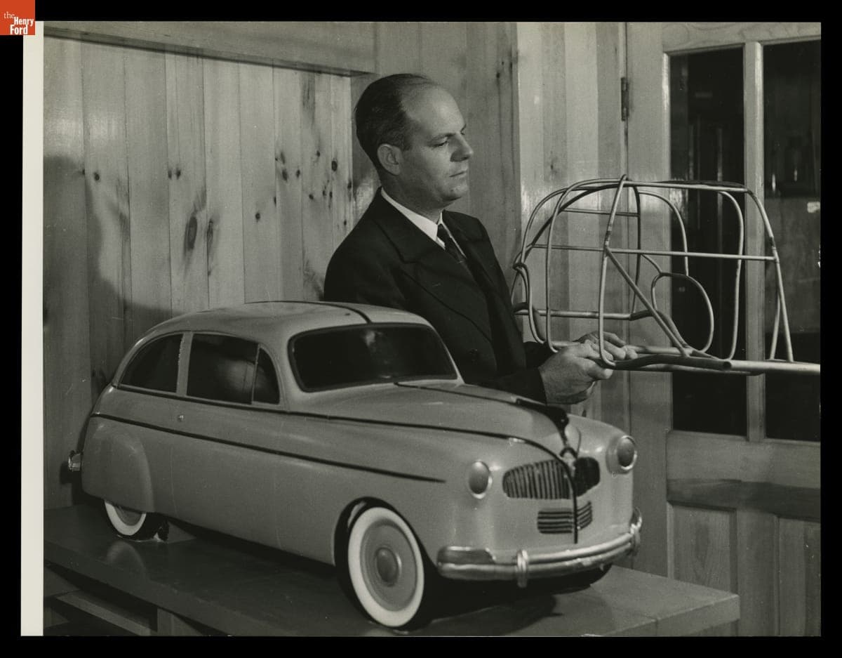 Robert Boyer with Soybean Plastic Car Scale Model and Frame, 1941