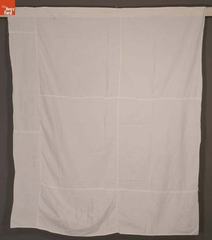 Bedsheet Pieced Together from Commercial Sacks by Susana Allen Hunter, 1950-1970