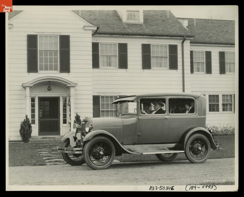 1928 Ford Model A Tudor in Front of Residence