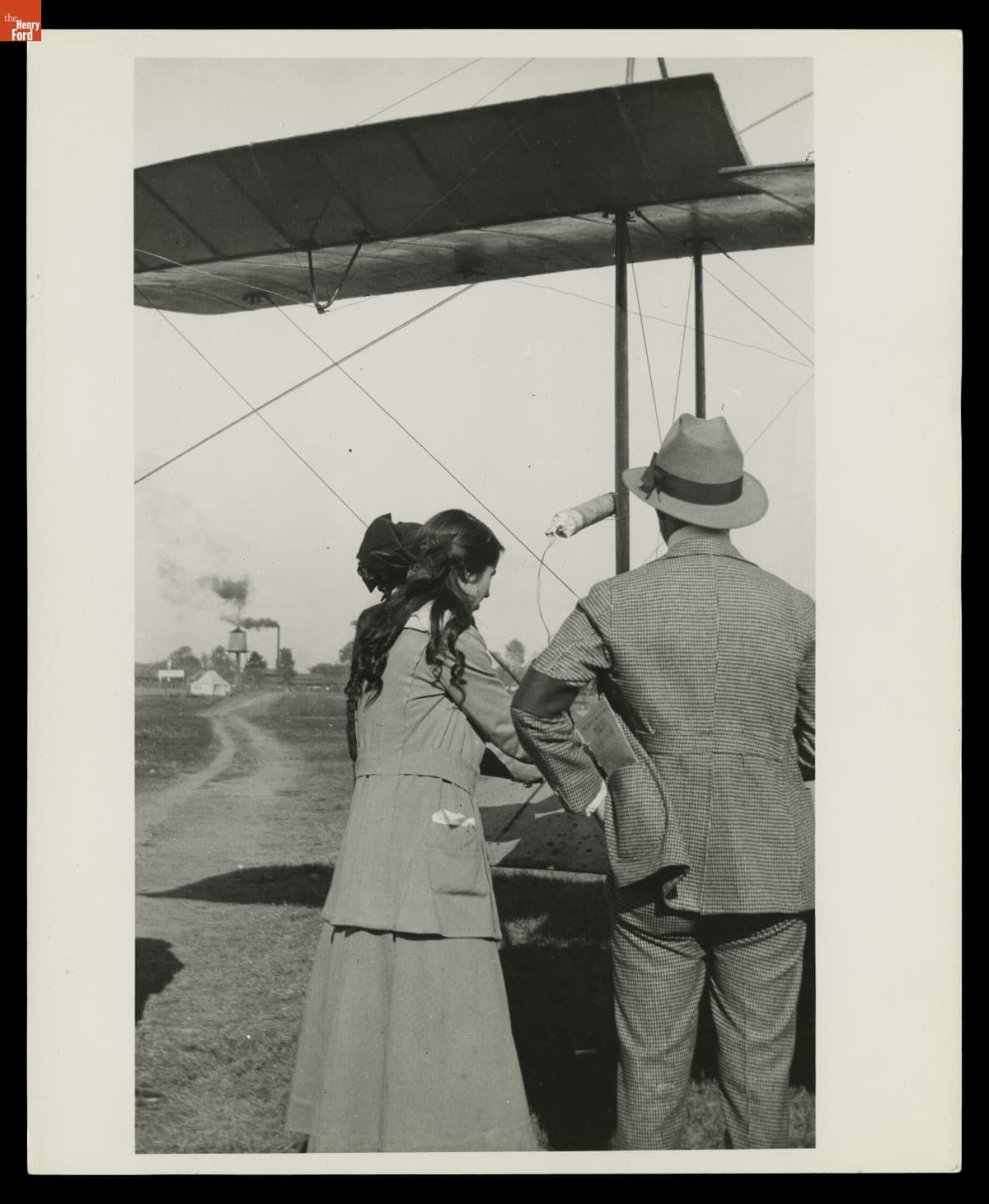 Katherine Stinson Securing Magnesium Flares to Her Laird Biplane at the Tri-State Fair, October 1916