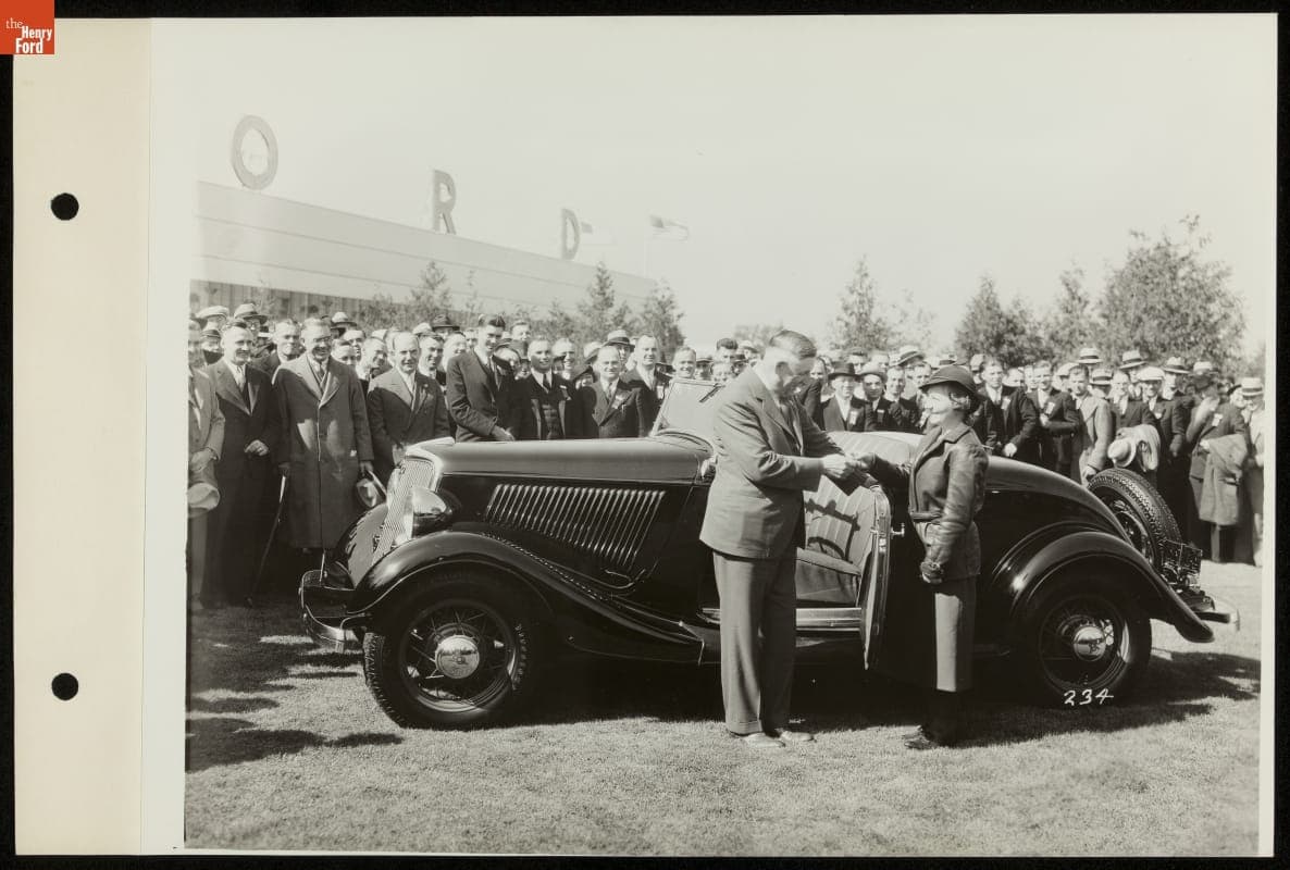 Man Greeting Woman in Ford Roadster, Century of Progress International Exposition, Chicago, Illinois, 1934