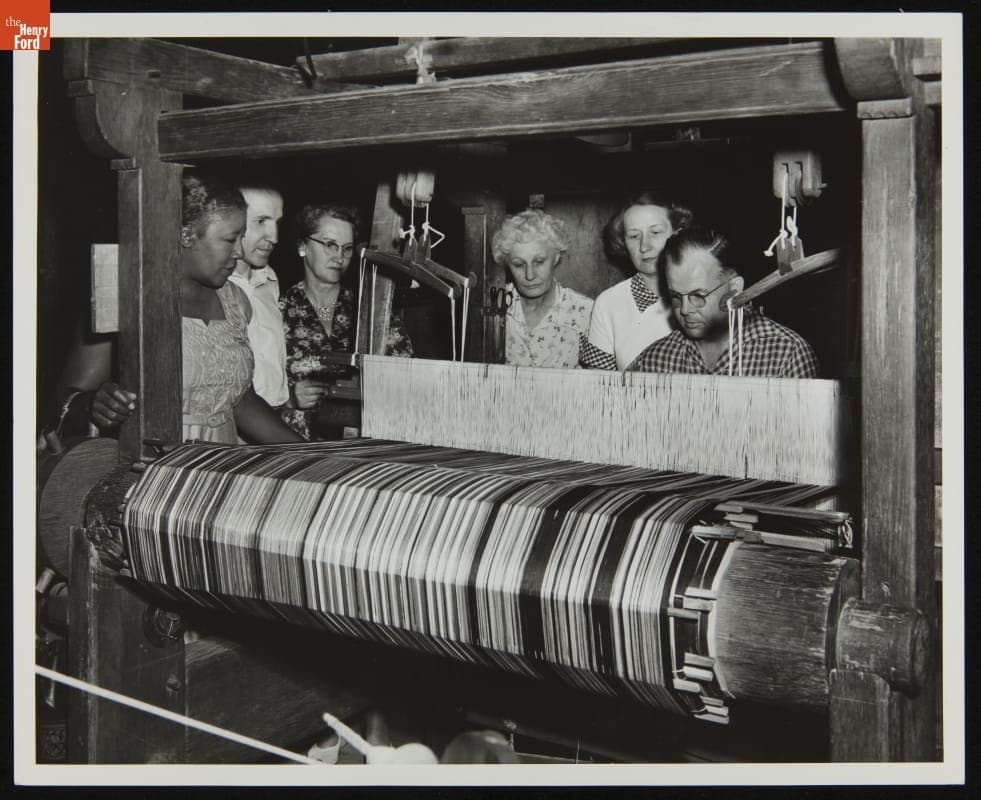 Bob Kaiser Using the Jacquard Loom in Gunsolly Carding Mill, Greenfield Village, 1954