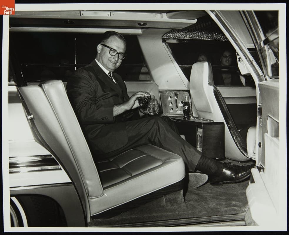 Man inside Ford Aurora Concept Car at New York World's Fair, 1964