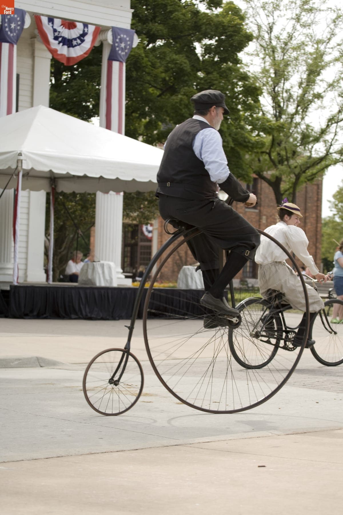 Bicyclists during World Tournament of Historic Baseball Event in Greenfield Village, August 2007