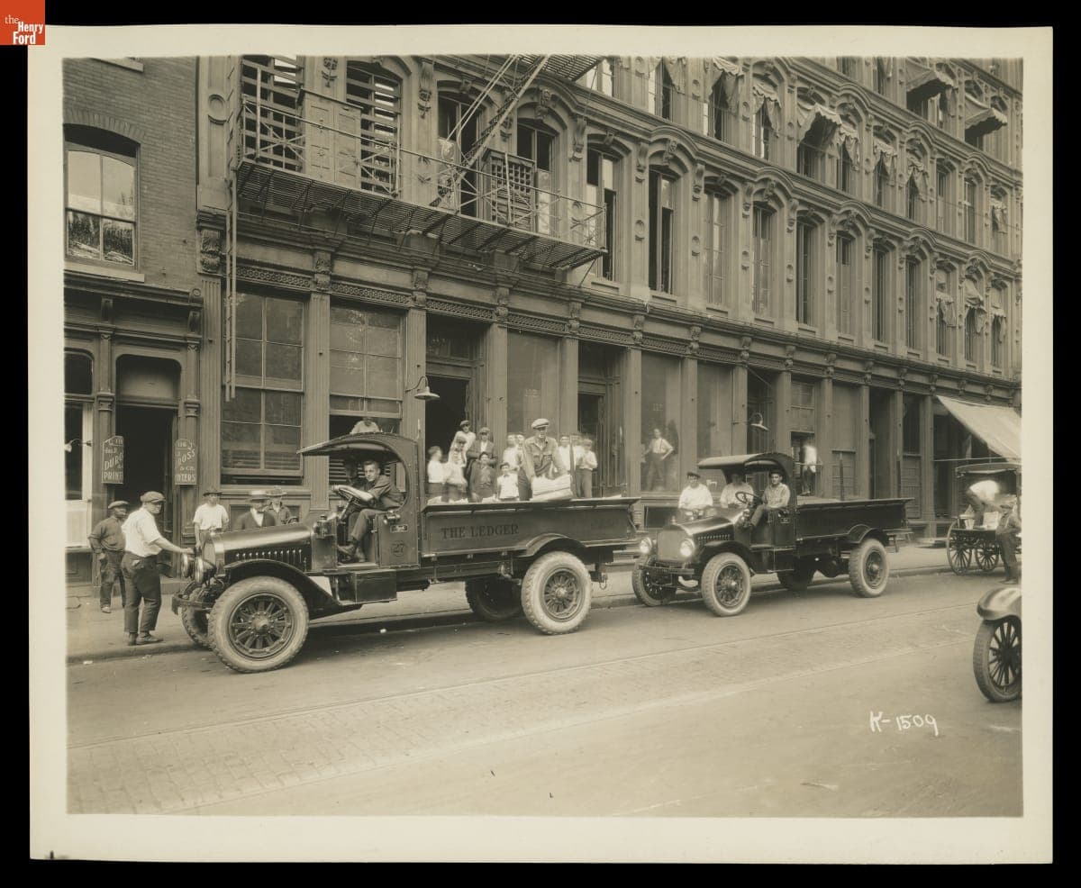Two Mack Model AB Trucks with Worm Drives Parked in front of Jos. P Duross & Co. Printers, 1911-1916