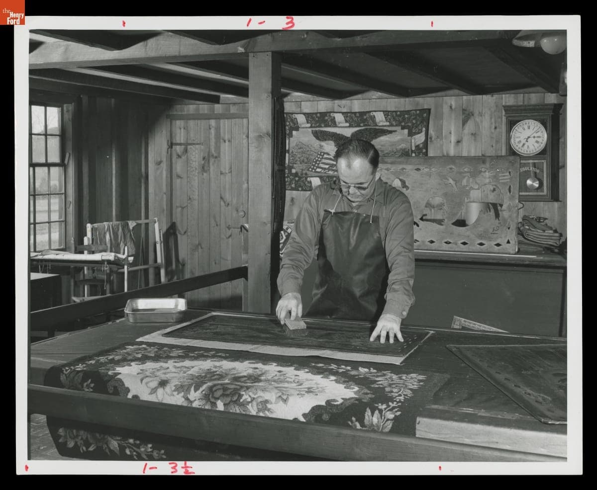 Robert Kaiser Making Hooked Rugs in the Weaving Shop, Greenfield Village, December 1959