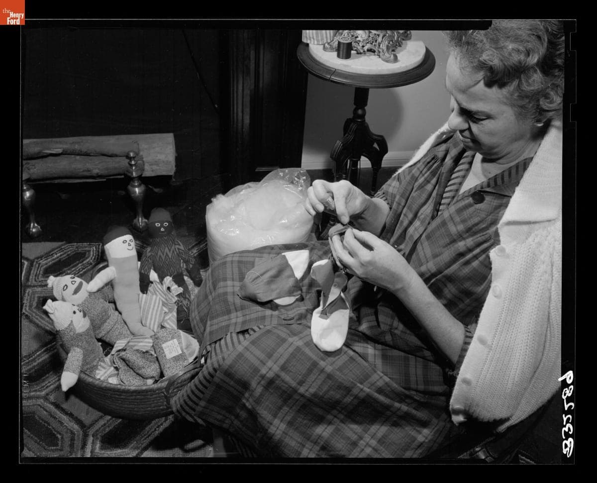 Yvonne Prieur Sewing Dolls at "Crafts at Christmas" Exhibition, December 1962