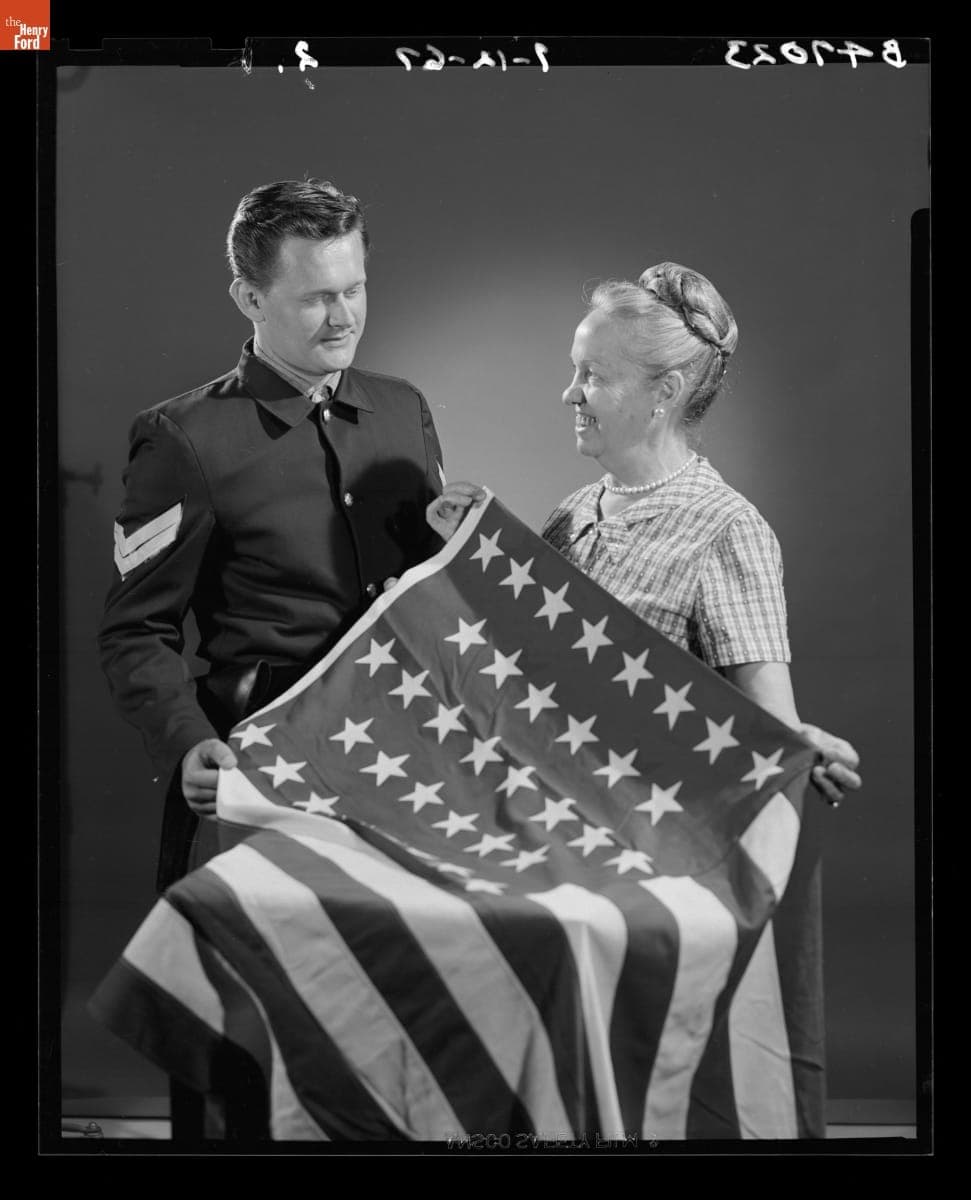 Yvonne Prieur Presenting Hand-Sewn 36-star Flag to Larry Billicki, July 1967