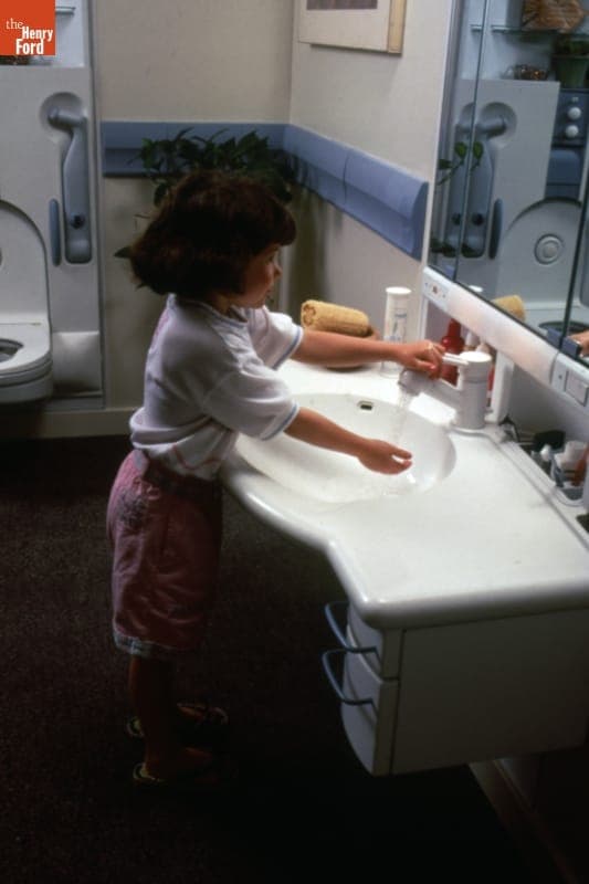 Child Using MetaForm Adjustable Bathroom Sink, circa 1987