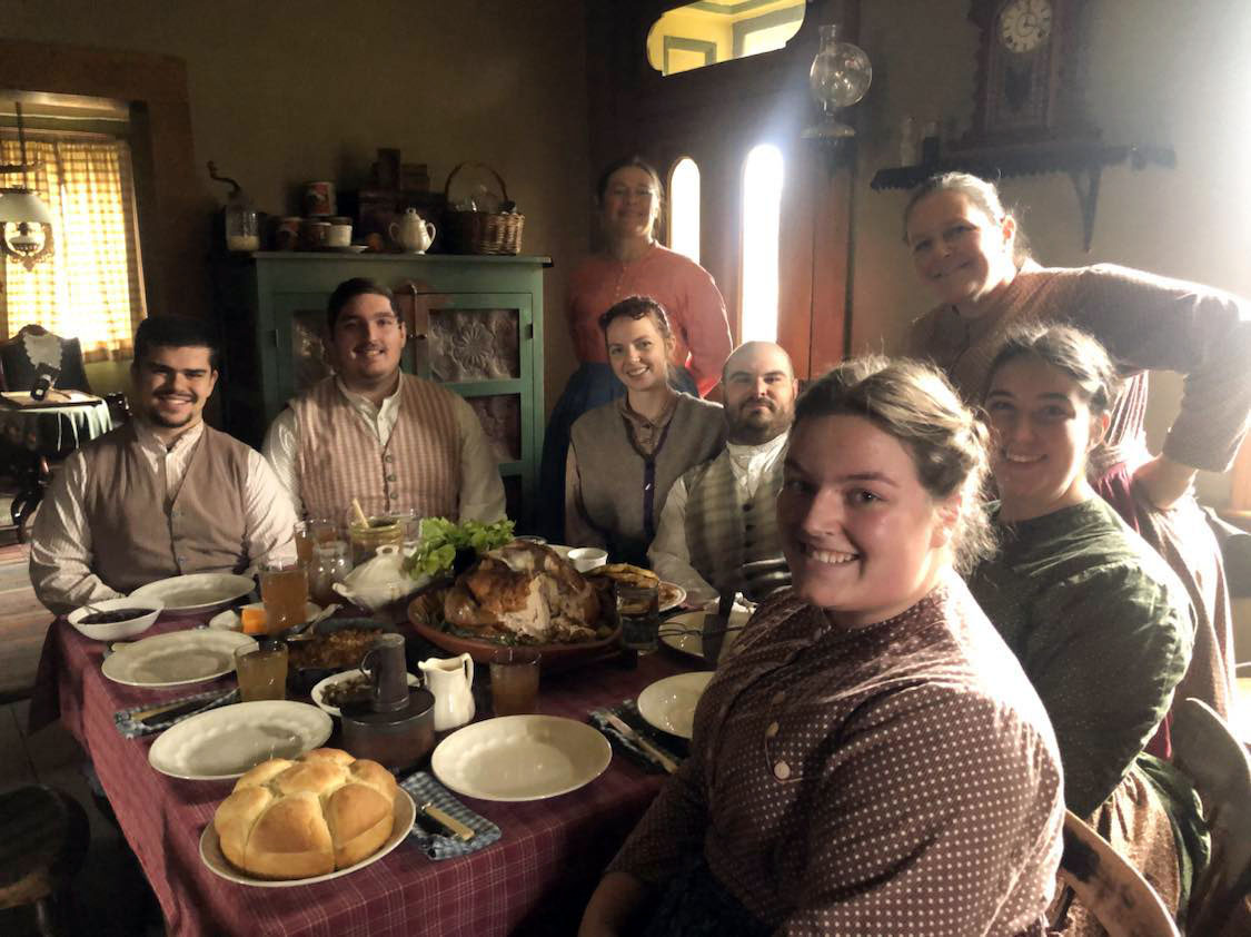 Presenters enjoy a Thanksgiving meal at Firestone Farm in Greenfield Village.