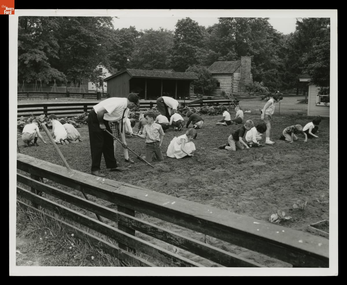  Students planting a garden behind McGuffey School in Greenfield Village, 1967