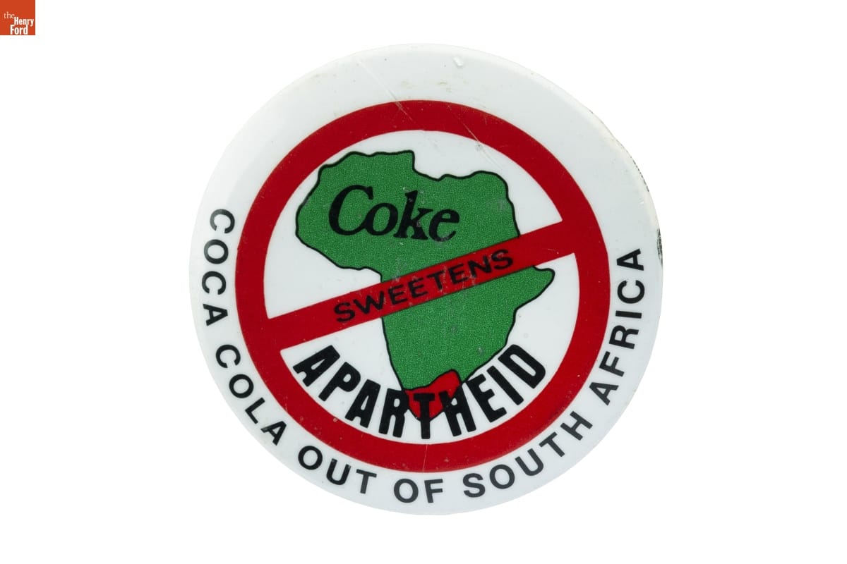 'Coke Sweetens Apartheid: Coca Cola Out of South Africa' button, circa 1985, created by the American Friends Service Committee for its Coke Boycott Campaign.